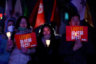 Protesters line the streets of Seoul on Wednesday